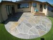 Artificial grass for front lawn & backyard with bluestone patio in San Rafael, California.
