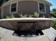 Landscaping project with firepit & waterfall in a backyard in San Jose, California.