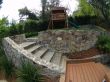 Artificial grass playground areas with stone walls done in Mill Valley, Bay Area, California.